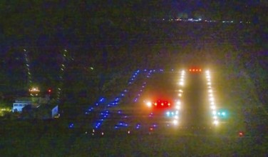 Aerial photo, Marl Loemühle airfield, night approach to the runway with PAPI, runway lighting,