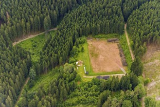 Aerial view, sports field in the forest as storage area, Hofolpe, Kirchhundem, Sauerland, North