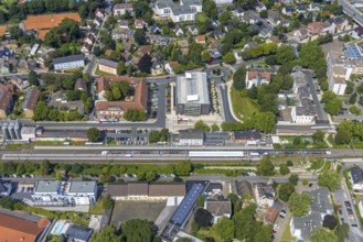 Aerial view, Kamen railway station with multi-storey car park and building of the Unna district