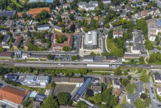 Aerial view, Kamen railway station with multi-storey car park and building of the Unna district