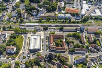 Aerial view, Kamen railway station with multi-storey car park and building of the Unna district