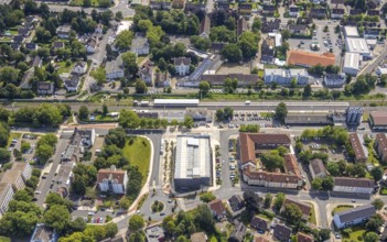 Aerial view, Kamen railway station with multi-storey car park and building of the Unna district