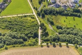 Aerial view, foot and cycle path Seseke-Weg with bridge over the river Seseke in the district