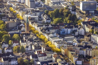 Aerial view, pedestrian zone Bahnhofstraße in autumn colours and St. Bonifatius Church in the