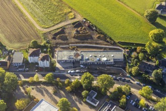 Aerial view, construction site with new building of a day care centre Am vineyard at Castroper