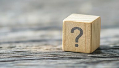 Wooden Cube Block Shape With Question Mark Symbol On Wood Table: Column Of Wooden Blocks With