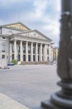 Detailed side view of a magnificent building with columns in Munich, Munich, Germany