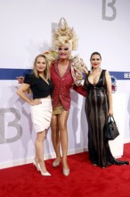 Regina Halmich, Olivia Jones and Djamila Rowe arriving at the Bertelsmann Summer Party 2025 at the