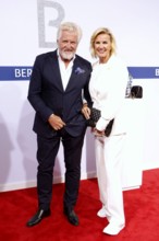 Hera Lind with man Engelbert Lainer-Wartenberg arriving at the Bertelsmann Summer Party 2025 at the