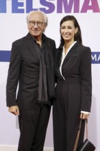 Wolf Baür and Pinar Atalay arriving at the Bertelsmann Summer Party 2025 at the Bertelsmann