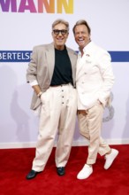 Thomas Rath (left) with partner Sandro Rath (right) arriving at the Bertelsmann Summer Party 2025