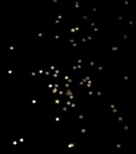Punched small metallic stars falling in front of black back