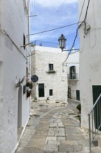 Alleyway in Ostuni, a city in Apulia, Italy