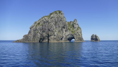 Sunny scenery showing a rock gate at the Bay of Islands, an area on the east coast of the Far North