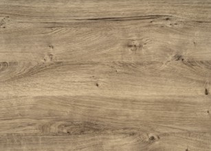 A full frame brown wood grain surface
