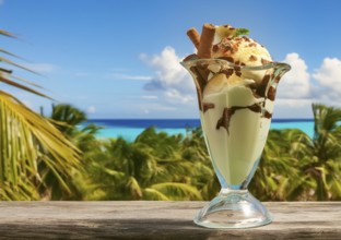 Ice cream sundae with chocolate flakes in sunny tropical ambiance, AI generated image