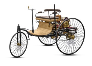 Replica of a old historic vehicle named patent motorcar isolated in white back with shadow