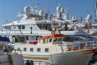 Harbor scenery with some yachts seen in Imperia, a coastal city in Liguria, Italy