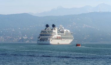 Cruise ship seen in Liguria, a region of north-western Italy in misty ambiance