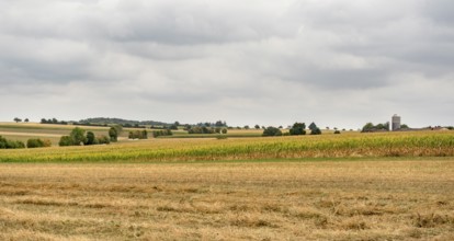 Stormy farmland scenery in Hohenlohe, an area in Southern Germany at late summer time