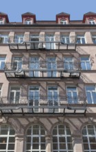 Sunny illuminated detail of a house facade seen in Nuremberg, a city in Bavaria, Germany