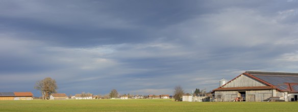 Panoramic agricultural scenery in Bavaria at evening time