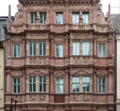 City view of Heidelberg showing a historic house facade in Germany at summer time