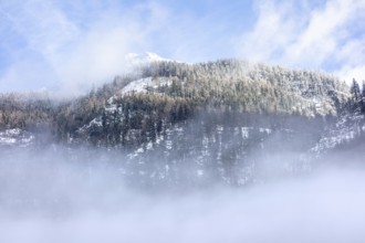 Alpine mountain top seen in the Berchtesgadener Land in Bavaria, Germany, at winter time