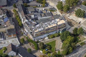 Aerial photo, roof construction work on the Mittelstraße shopping centre and residential building