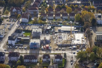 Aerial view, construction site with new building for housing and social services on the former