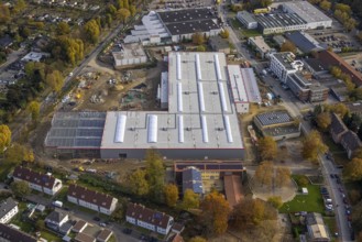 Aerial view, industrial area Krusenkamp with construction site and new building for planned DIY