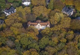 Aerial view, music school of the city of Gladbeck in the autumnal forest in the district Rentfort