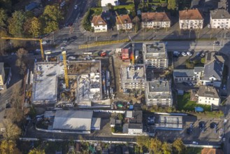 Aerial view, construction site with new building for housing and social services on the former