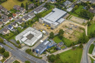 Aerial view, construction site and new construction of a manufactory commissioning area