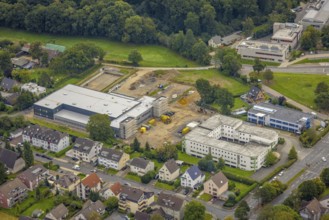 Aerial view, construction site and new construction of a manufactory commissioning area