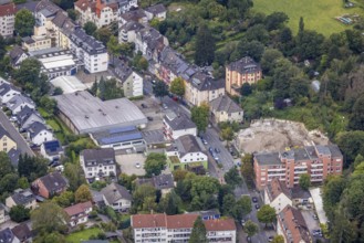 Aerial view, residential buildings and construction site with demolition of the Hotel Harnau on