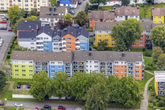 Aerial view, colourful house facades of the GWG housing estate on the street Am Quambusch in the