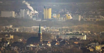 Aerial view of St. Pancratius Church with a view of the harbour and the Jäckering Group mill in