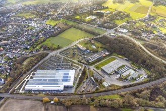 Aerial view commercial area mountains with transport company Hamm, Auto Zentrum Dr. Mertens, garden