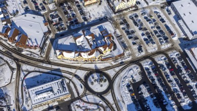 Aerial view, snow-covered roundabout on Ostwennemarstraße, Maxi-Center, shopping centre, Rewe,