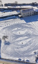 Aerial view, snow-covered field Marker Dorfstraße, winter, vehicle tracks in the snow, Uentrop,