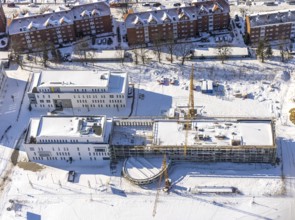 Aerial view, snow, winter, construction area Paracelsuspark with innovation centre, SCI:Q Science