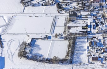 Aerial view, snow-covered sports facility, snow on roofs and streets, VFL Mark, Realschule Mark,