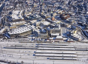 Aerial view, Hamm main station, tracks and platforms in the snow, winter, city centre,