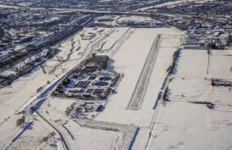 Aerial photo, EDLH airfield in the snow with cleared runway, Mattenbecke sewage treatment plant,
