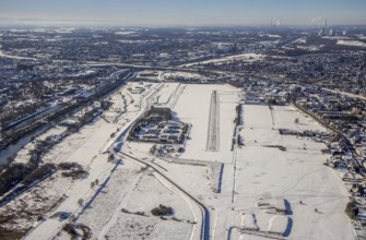 Aerial photo, EDLH airfield in the snow with cleared runway, Mattenbecke sewage treatment plant,