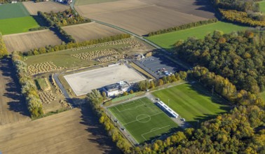 Aerial view, construction site and new sports field with stands and a club building with sports day