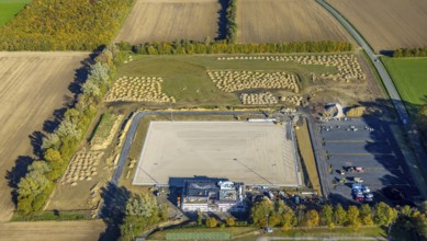 Aerial view, construction site and new sports field with stands and a club building with sports day