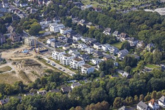 Aerial view, construction site and new construction of the Paracelsuskarree housing estate at the