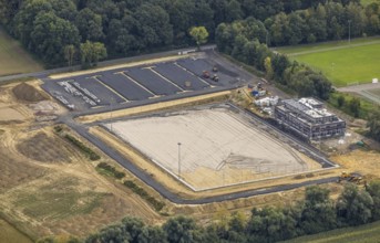 Aerial view, construction site and new construction sports ground Papenloh An der Lohschule in the